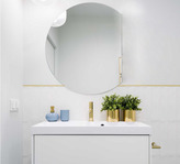 Zdjęcie do “Lustro ścienne 50cm bez ramy okrągłe ścięty bok”.