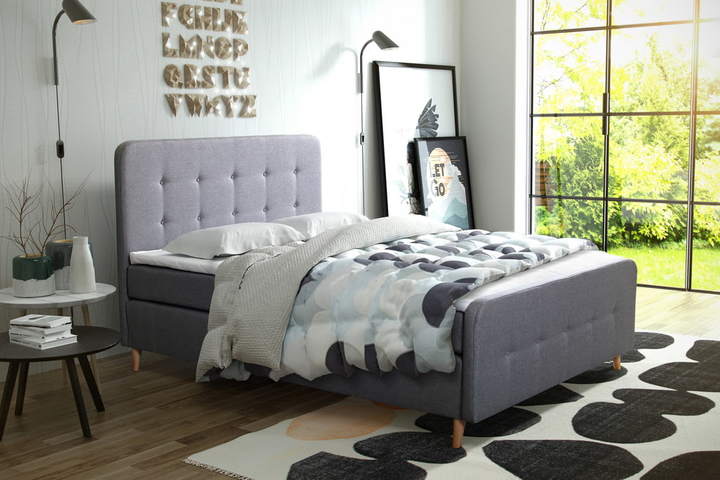 Łóżko kontynentalne szare z pikowanym zagłówkiem na drewnianych nogach 160x200
